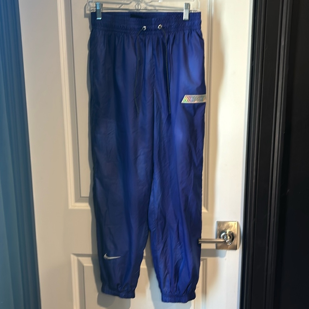 Nike purple small wind breaker jogger pants